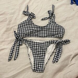 Medium Black & white gingham bikini. Adjustable ties on bottom and top!